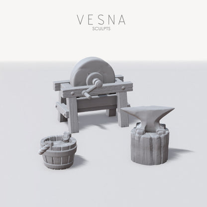 Blacksmith anvil and grindstone