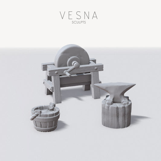Blacksmith anvil and grindstone