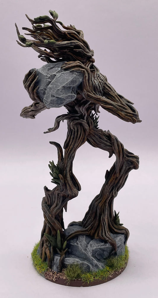Treewalker throwing rock