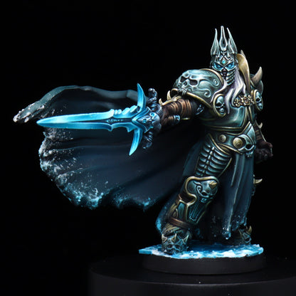 A painted fantasy miniature figurine of an armored warrior holding a glowing blue sword, displayed on a black pedestal against a black background.